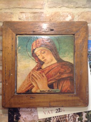 Madonna in cotto su cornice in legno