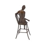Dama in Bronzo Seduta